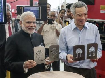 Prime Minister Narendra Modi and Singapore Prime Minister Lee Hsien Loong at the Institute of Technical Education College in Singapore on Tuesday.