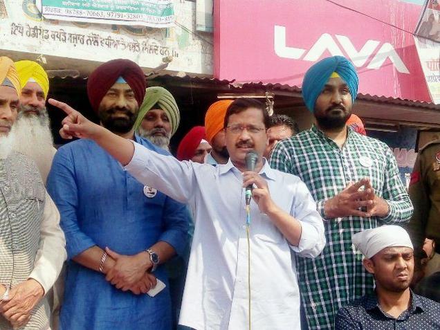 Delhi Chief Minister Arvind Kejriwal addresses the people at Dhilwan in Punjab on Sunday.